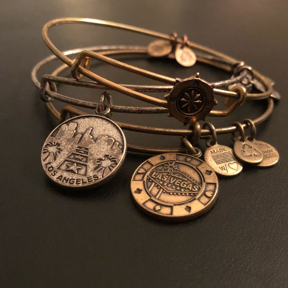 Three Alex & Ani bracelets